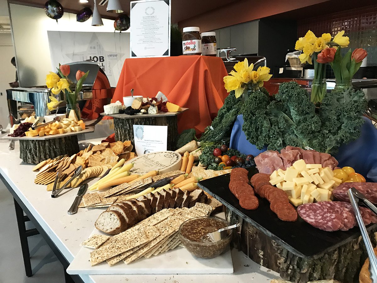 A buffet table with many different types of food.