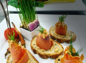 A plate of food with some vegetables on it