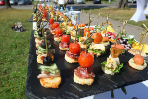 Guests enjoying a social event with Pear Tree's signature dishes