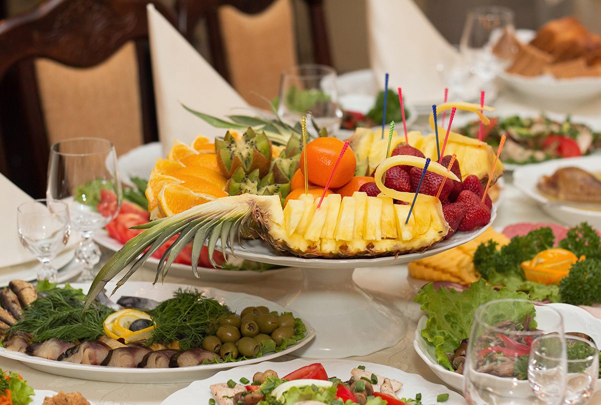 A table filled with lots of different types of food.